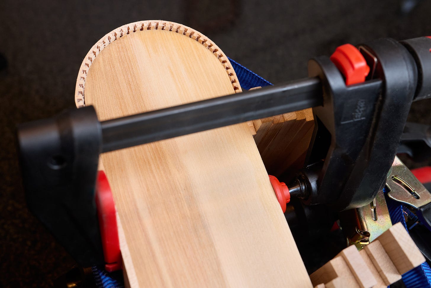 Kerf-bending side walls using a template.